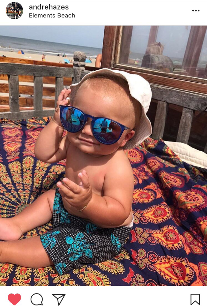 Instagram post van André Hazes met een kindje op een Bohemida strandkleed