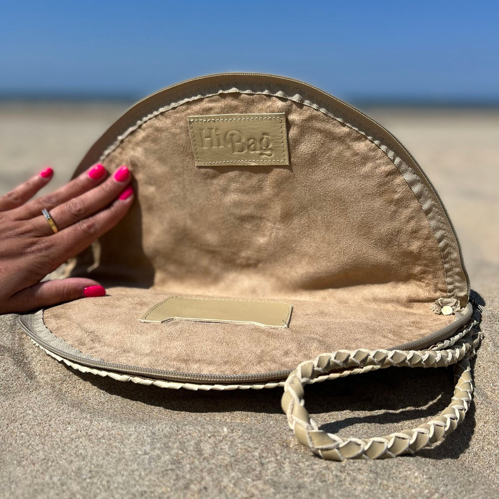 Basic rattan clutch, opened in the hand