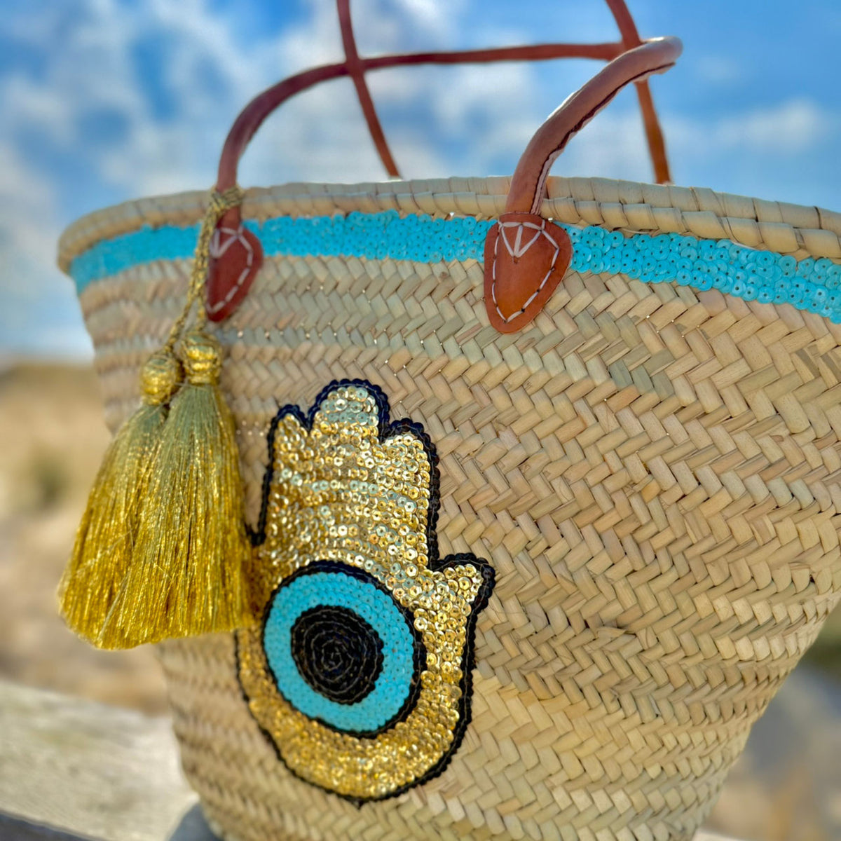 Boho rattan beach bag Hamsa Marrakech, with Hamsa hand and gold tassel