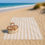 Luxury XXL hammam towel beige striped 240x210 cm, spread out on the beach with a rattan bag