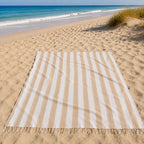 Luxury XXL hammam towel beige striped 240x210 cm, spread out on the sand