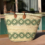 Rattan shopper with colourful embroidery light green, by the pool
