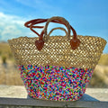 Rieten strandtas Dounia Multi met pailletten, met open vlechtwerk en gekleurde pailletten