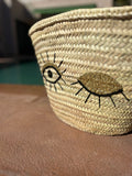 Rieten strandtas met pailletten Eyes, close-up van het ogenmotief