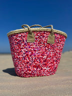 Straw beach bag with sequins pink, red and white, front view