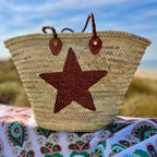 Straw beach bag with sequins Star brown, on the beach